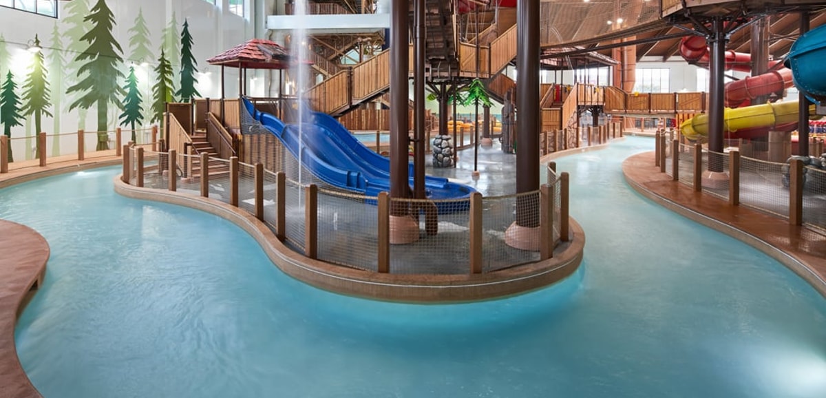 Family riding tubes enjoying the lazy river attraction