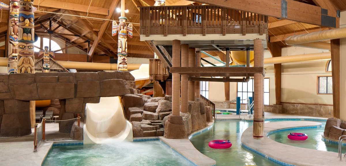 Body slide surrounded by rock decor