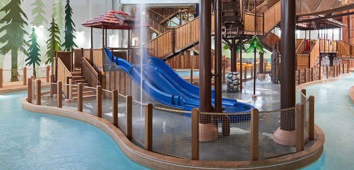 A vibrant water park featuring multiple colorful slides and attractions for visitors of all ages.