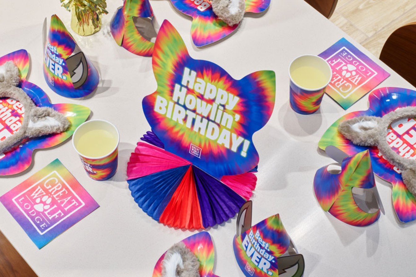 birthday cap on a table with decorations