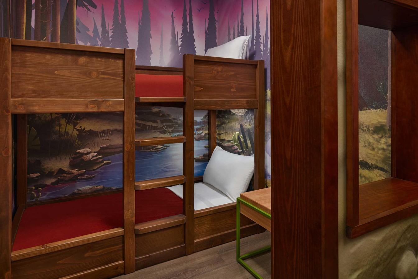 bunks beds in a wolf deb themed suite