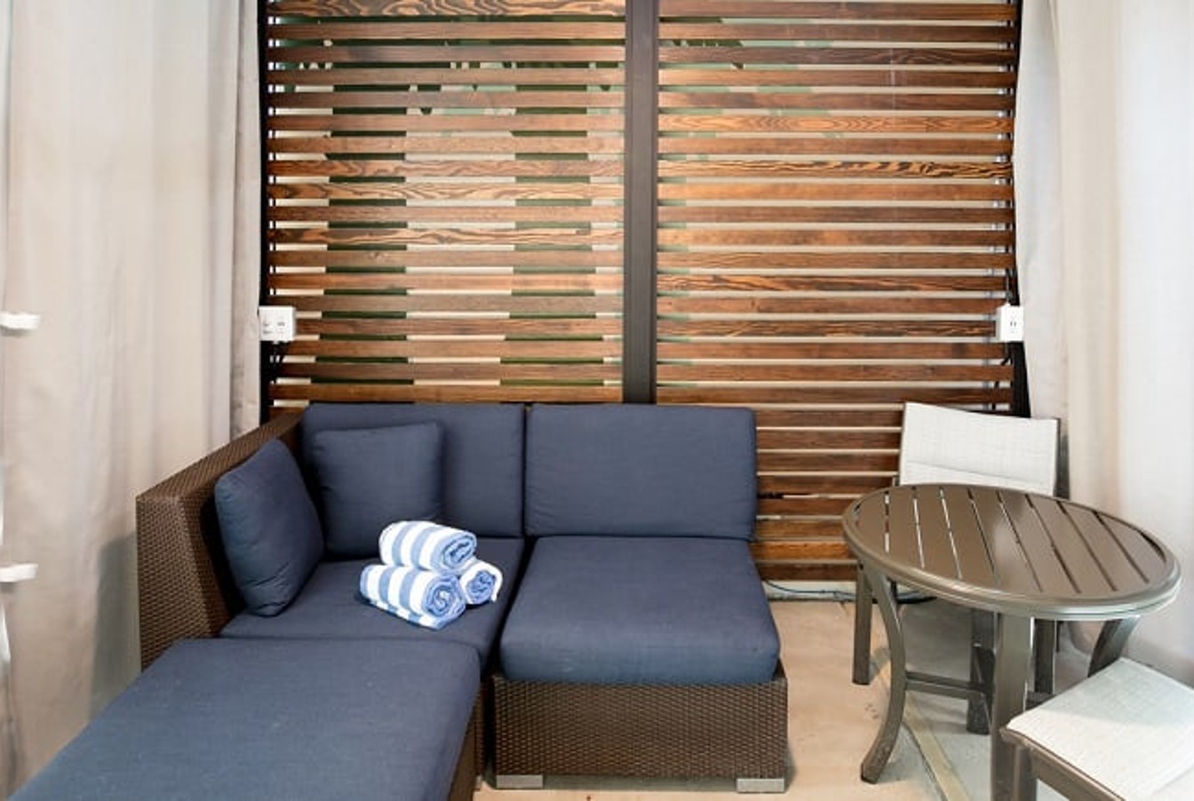 A family in a cabana at Great Wolf Lodge indoor water park and resort.