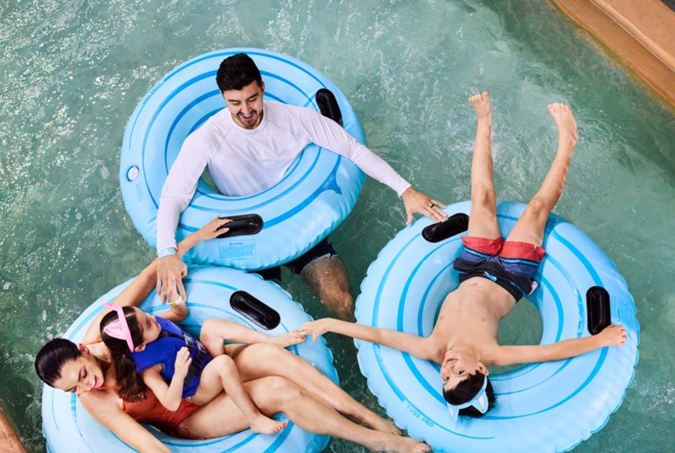 Family having fun together on a lazy river