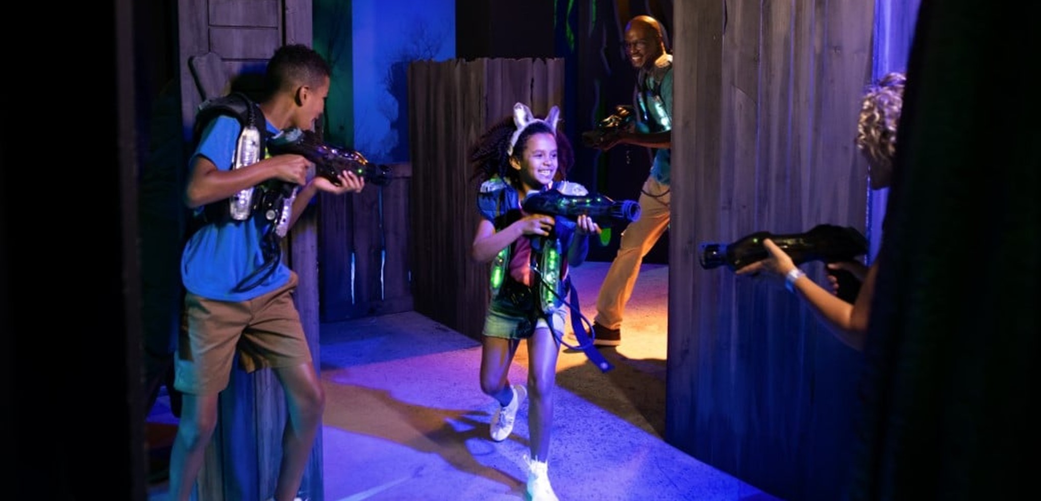 Kids having fun playing laser trail