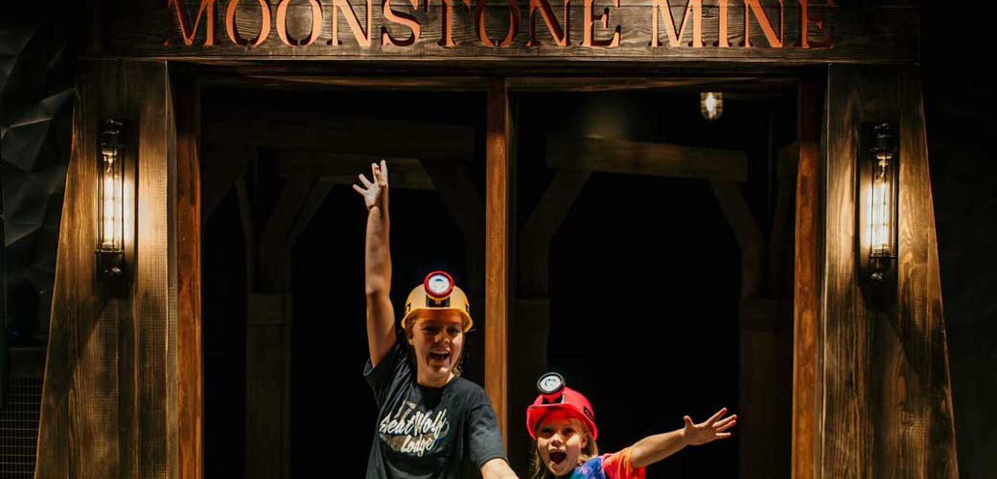 A teenager and a kid entering Moonstone Mine