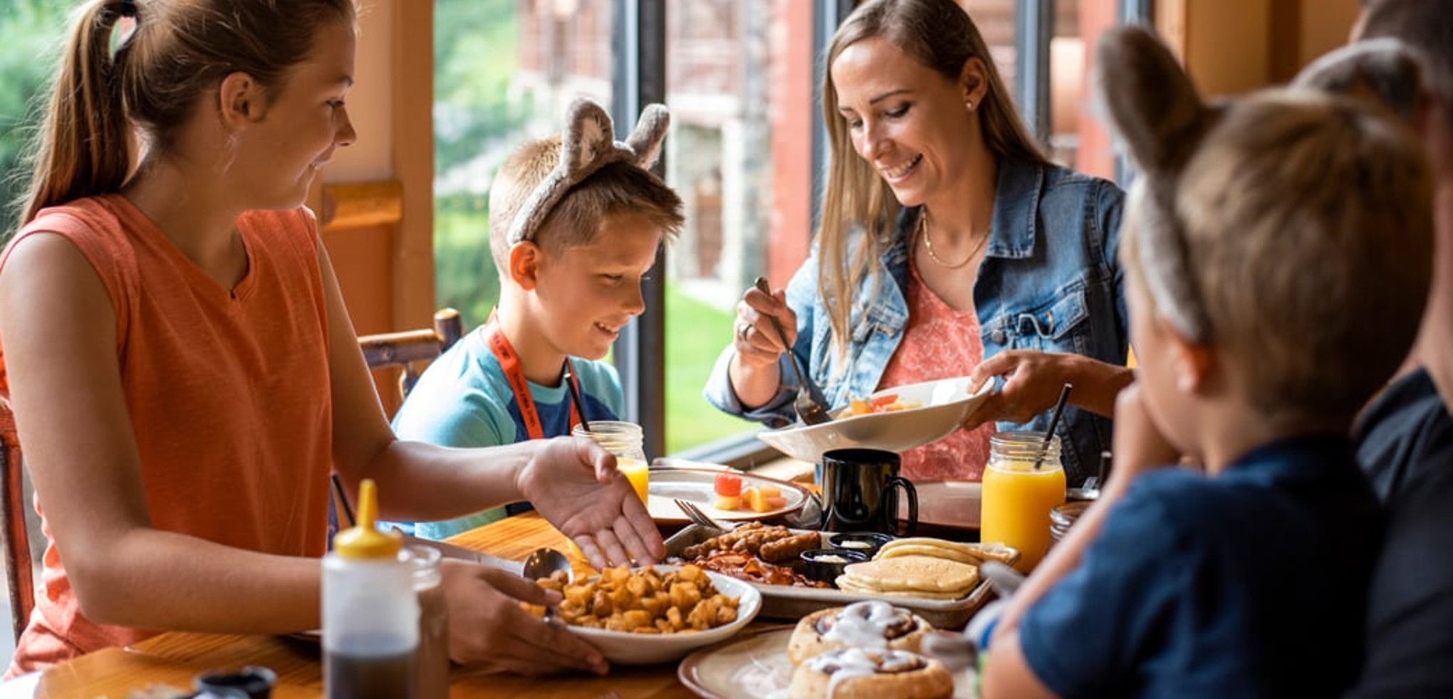 Family enjoying their breakfast at Great Wolf Lodge