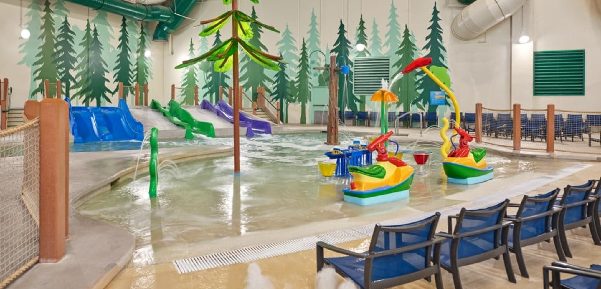 mother and child enjoying in a kidee pool in waterpark