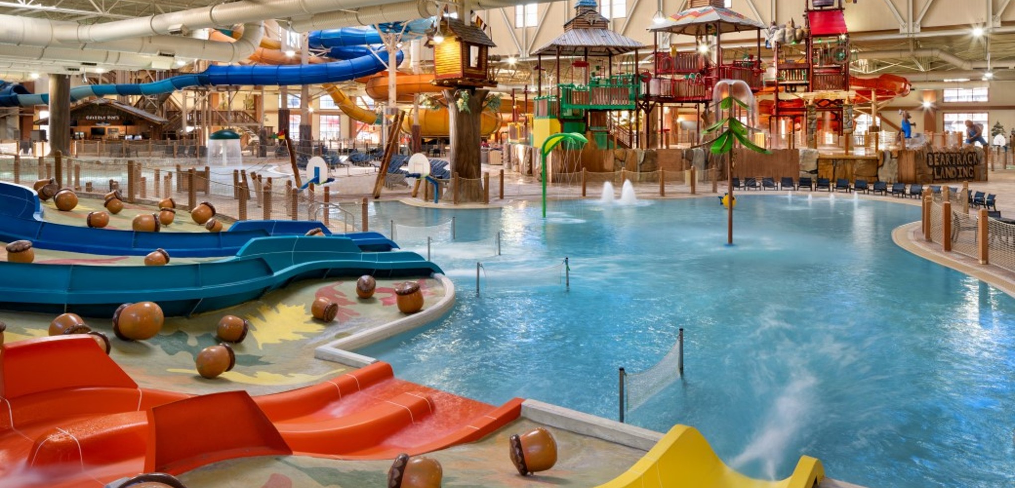 kid rides down waterslide