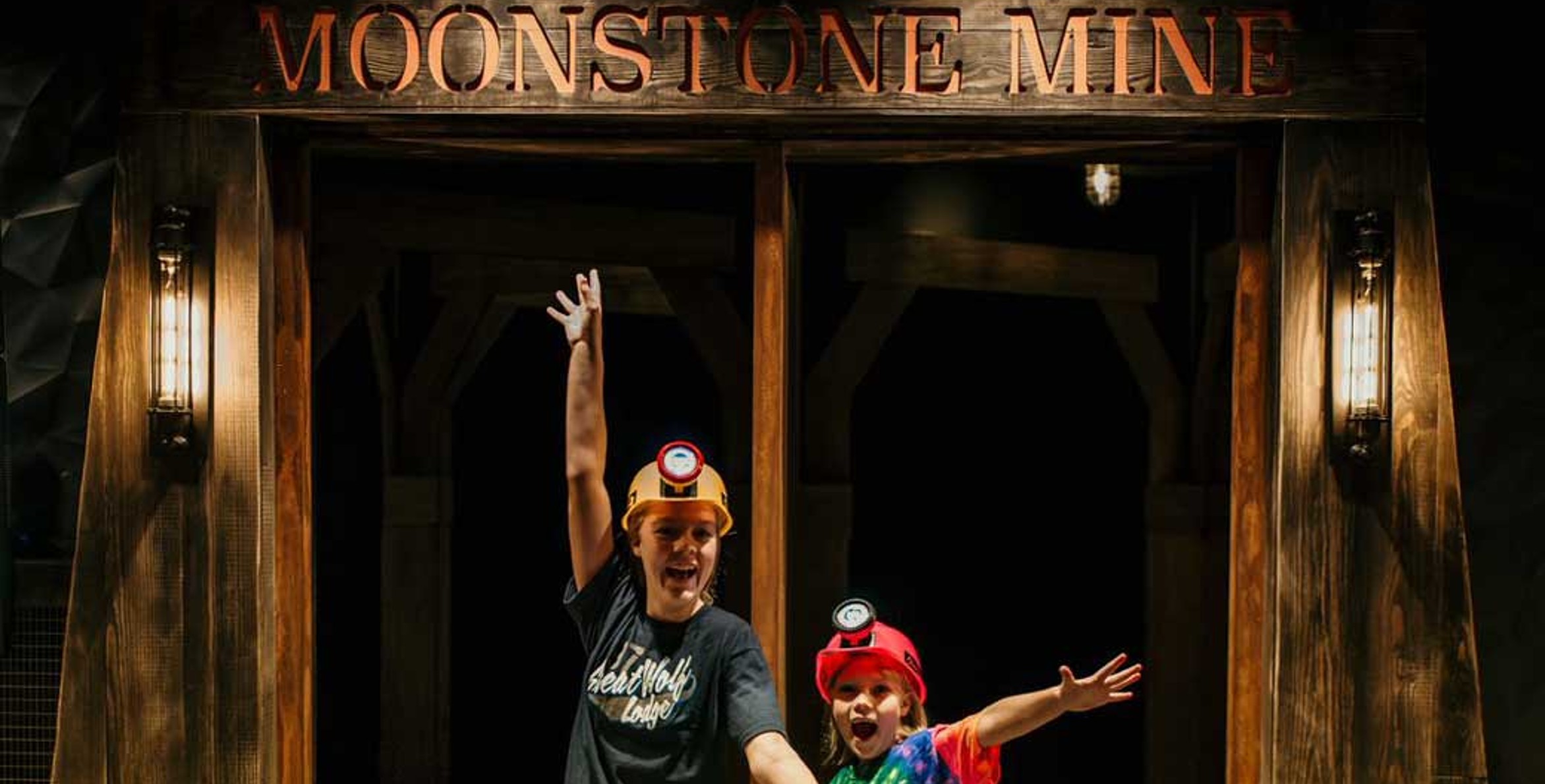 A teenager and a kid entering Moonstone Mine