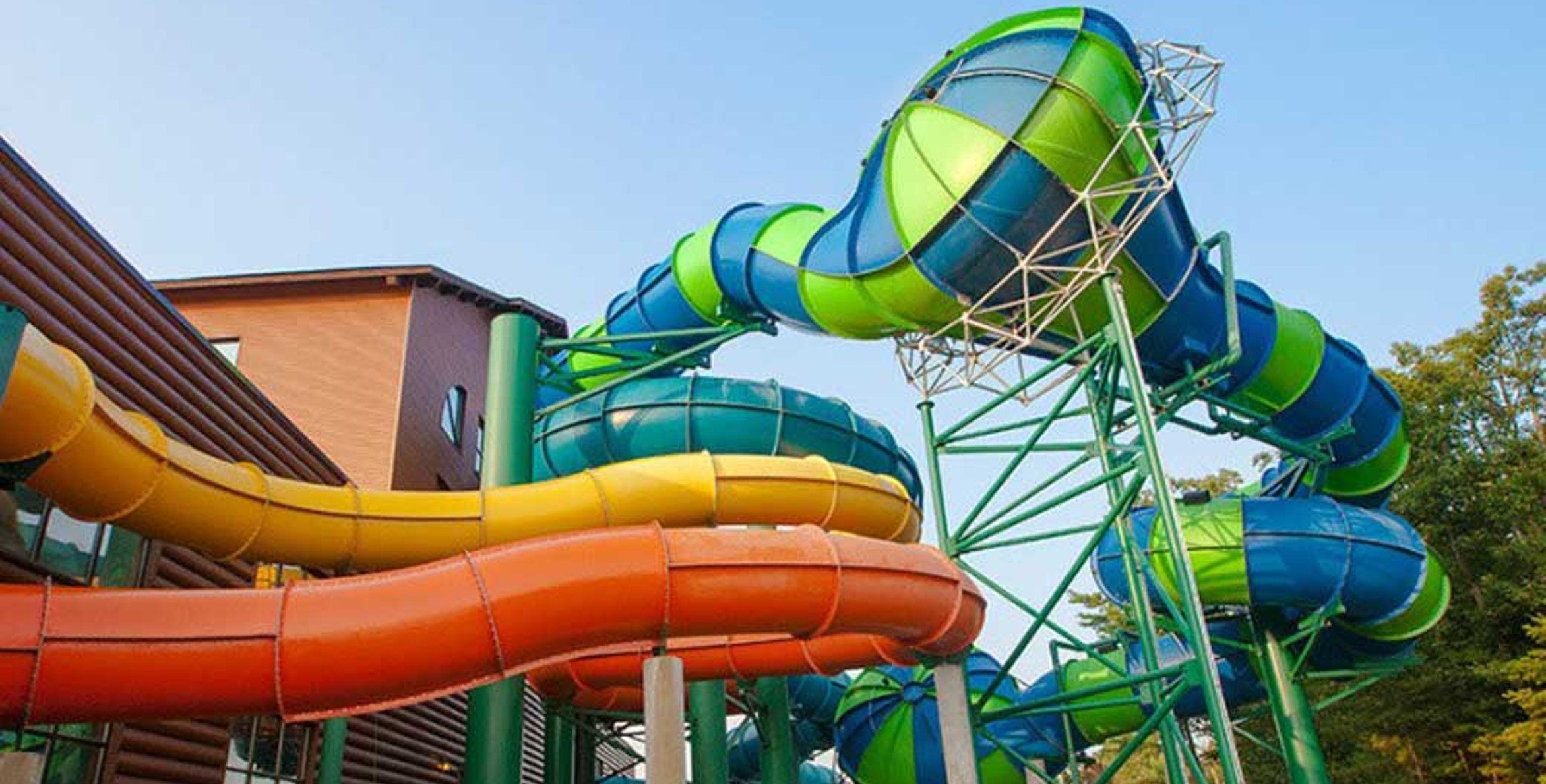 Outside view of three enclosed waterslides 