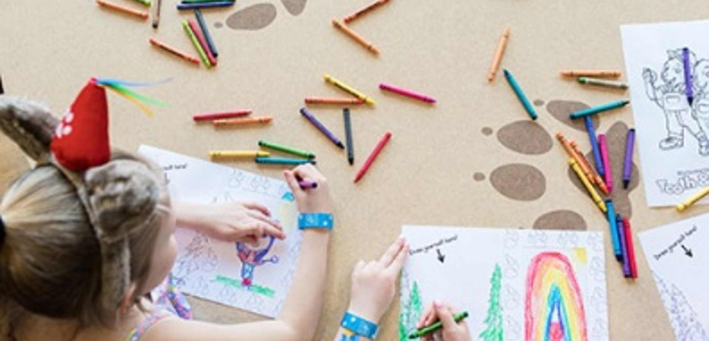 Kids color pictures at Great Wolf Lodge indoor water park and resorts.