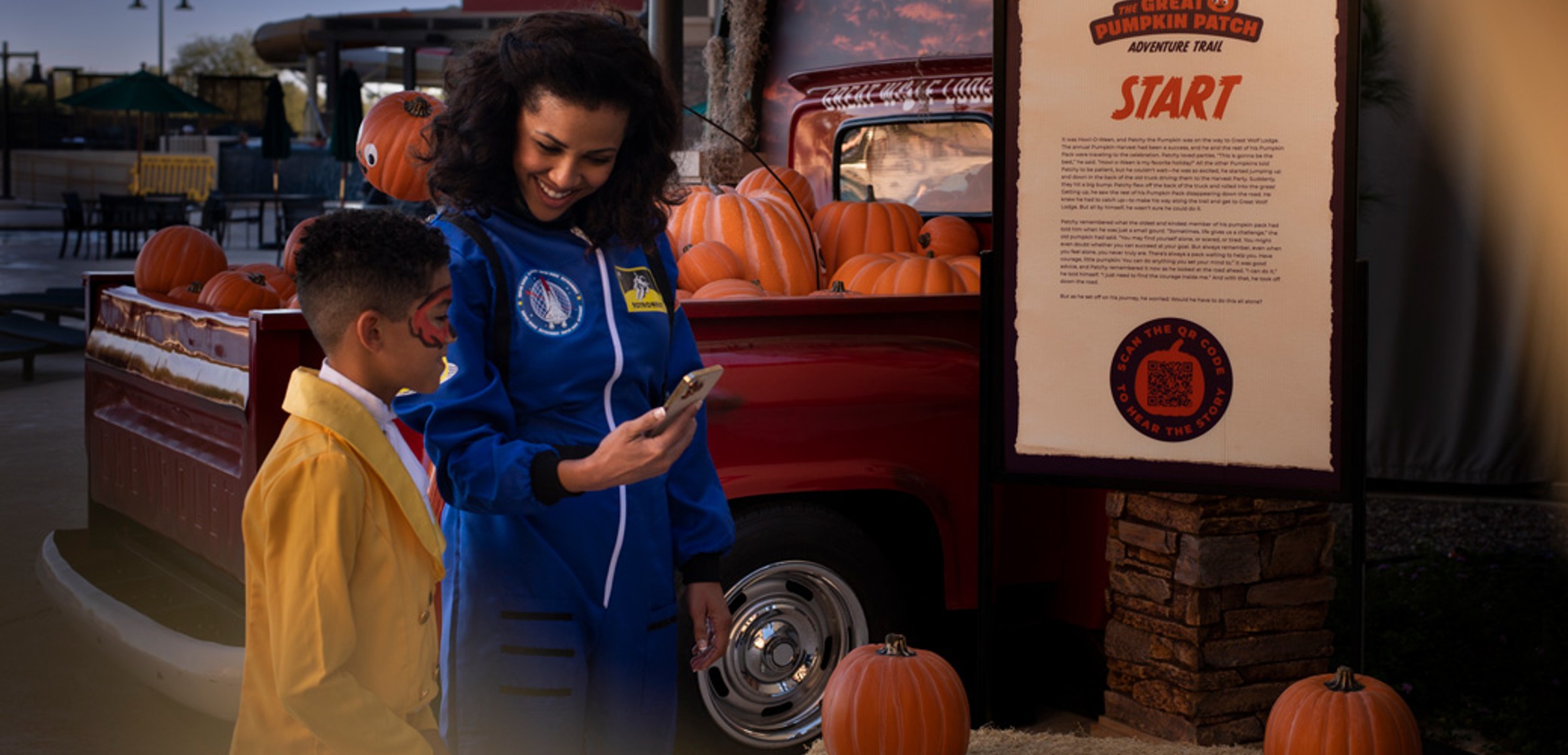 lodge representative helping boy with the trail map