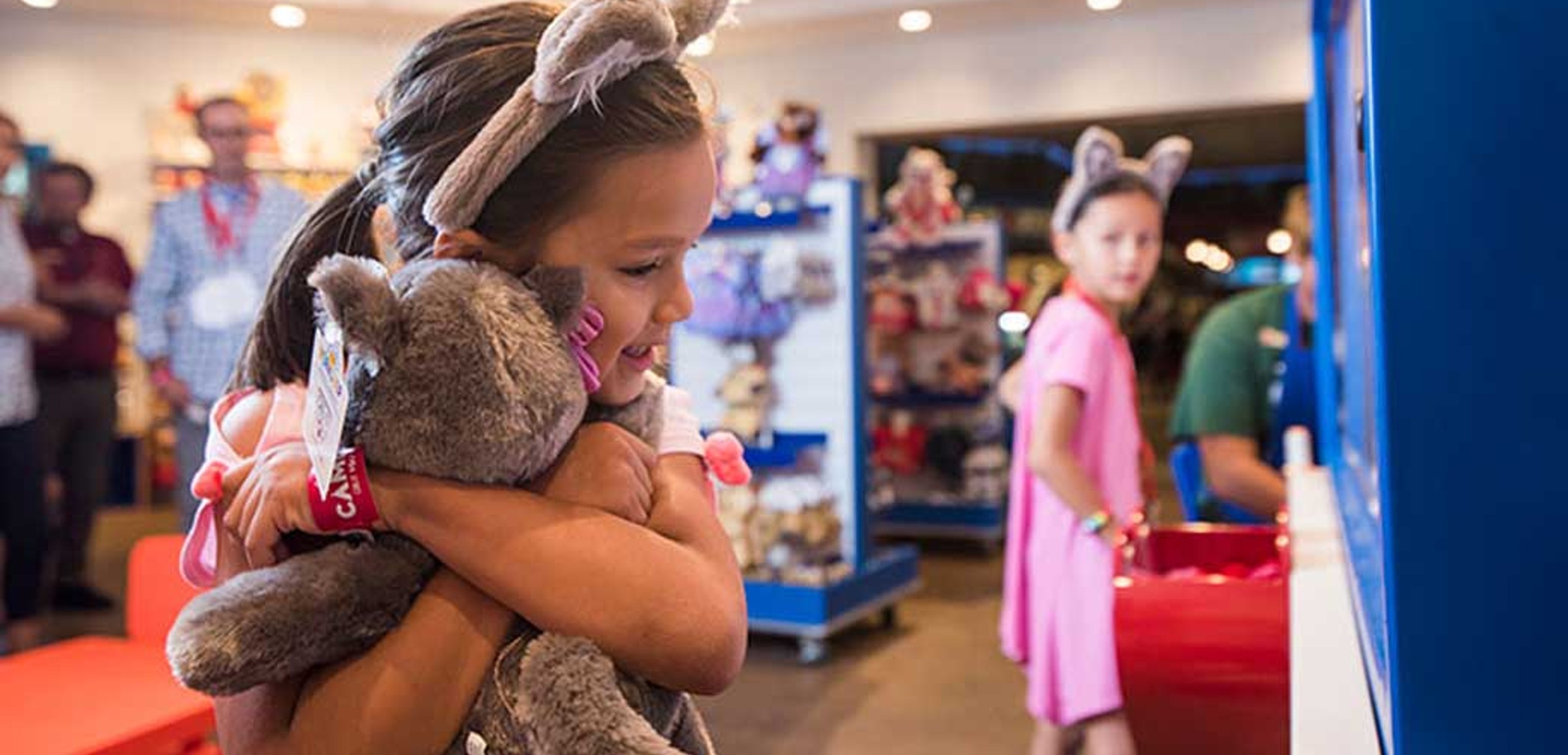 Girl holding a Stuffed animal 