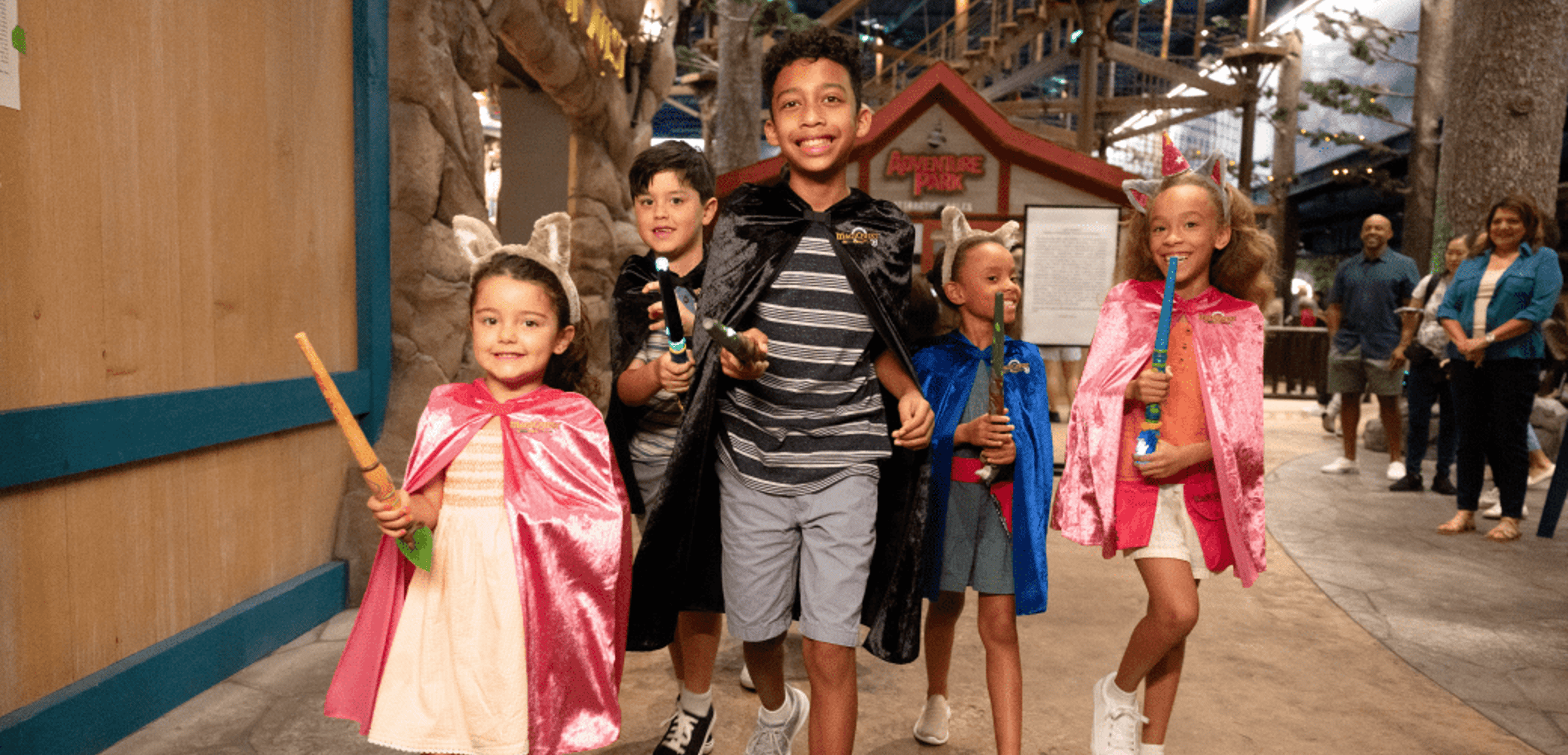 kid being awarded a master magi certificate