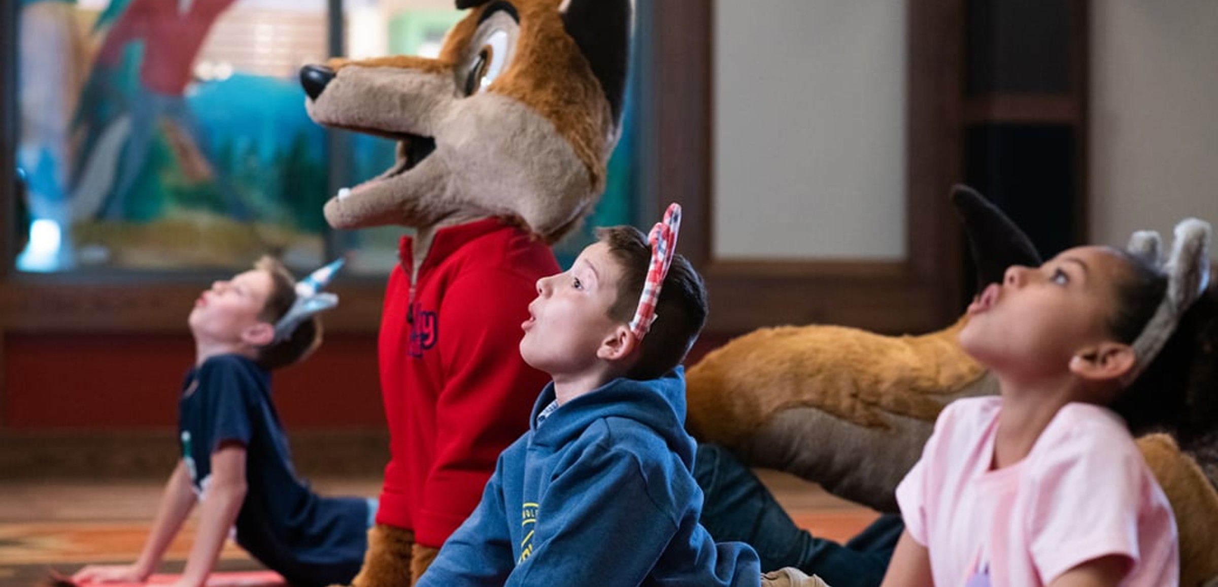 kids doing yoga with Wiley