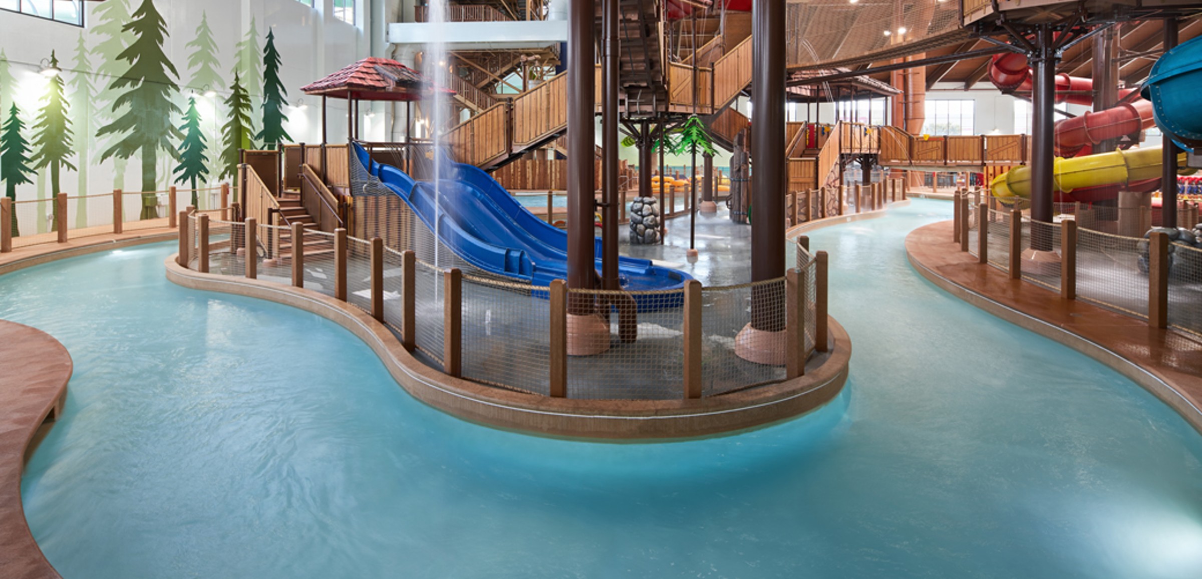 Family riding tubes enjoying the lazy river attraction