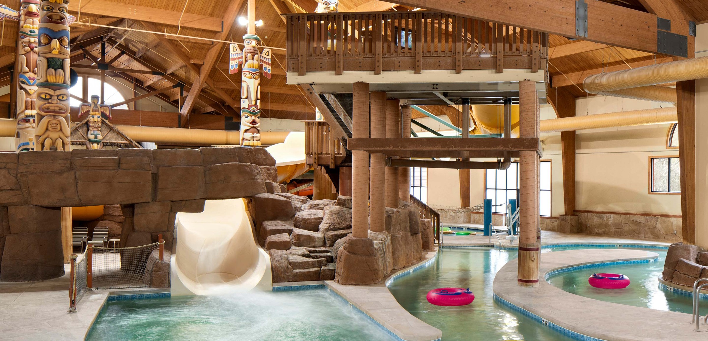 Body slide surrounded by rock decor
