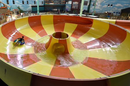 An aerial view of the open waterslide and surrounding park 