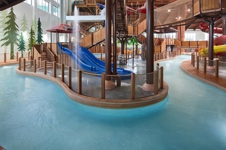 Family riding tubes enjoying the lazy river attraction