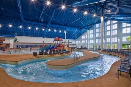 Family riding tubes enjoying the lazy river attraction