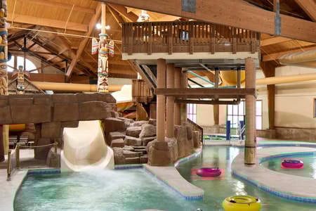 Body slide surrounded by rock decor