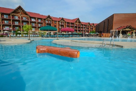 wood play structure in an outdoor pool
