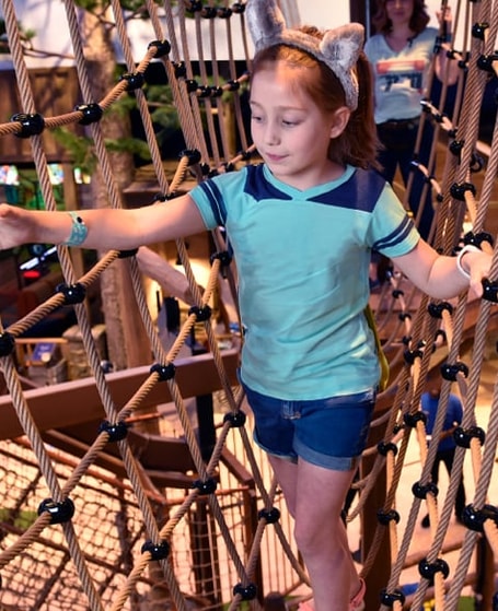 child exploring the Howlers Peak Adventure Trail