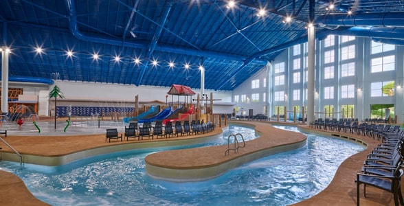 Family riding tubes enjoying the lazy river attraction