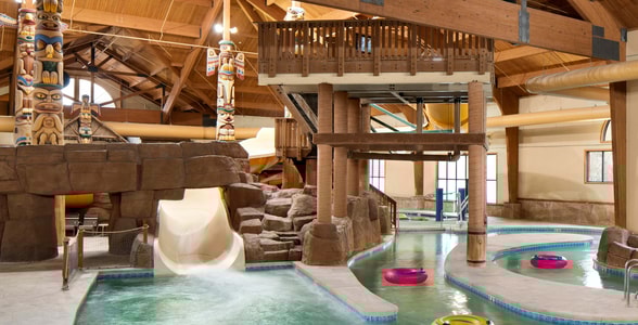 Body slide surrounded by rock decor