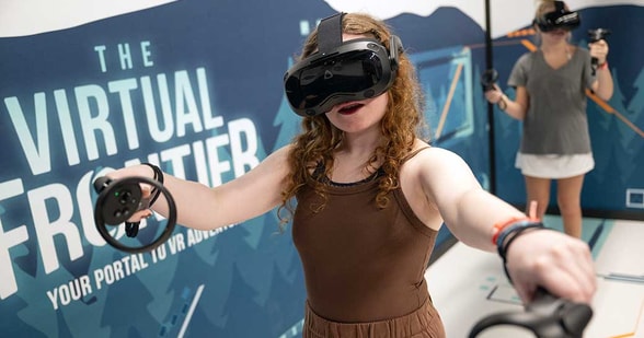 Kids playing a virtual reality game