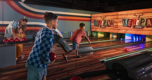 kids playing bowling