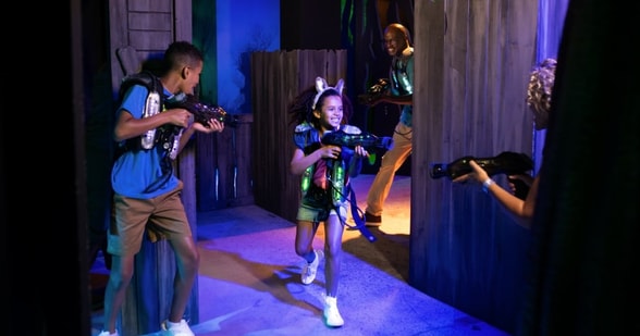 kids playing a game of laser trail