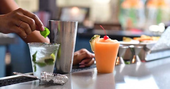 barman serving cocktails