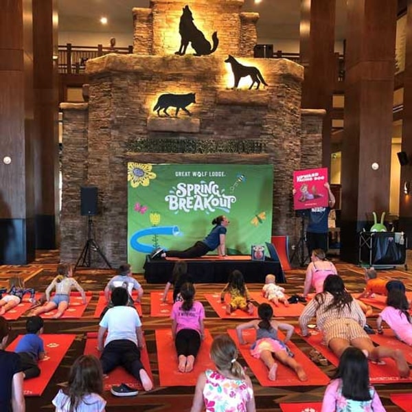 group of guests doing yoga in the main lobby