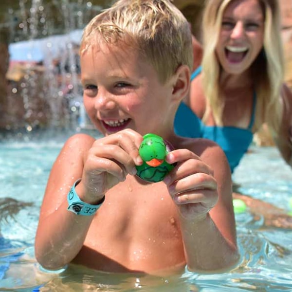 kids playing in an outdoor pool
