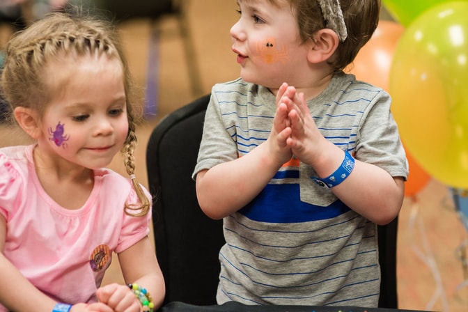 Wiley the wolf and a boy during a dance party