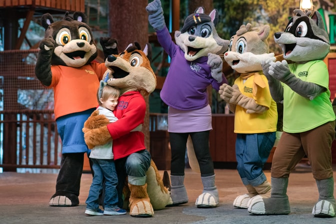 Wiley the wolf and a boy during a dance party