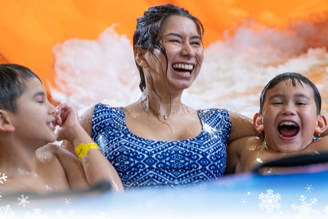 Mother and sons enjoying a indoor water park at Great Wolf 