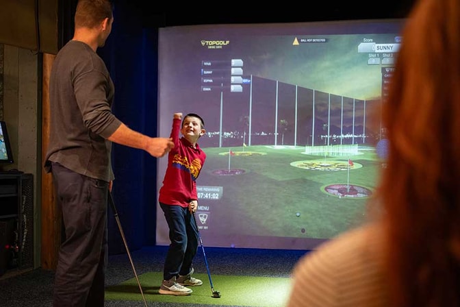 father and son playing at the Grounds