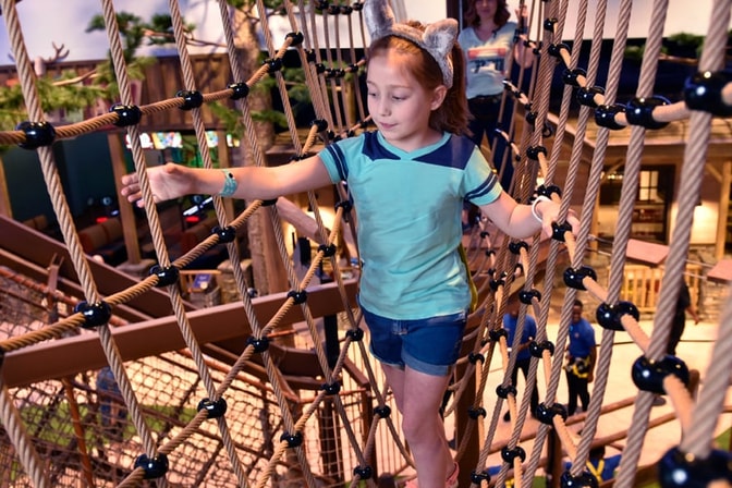 child exploring the Howlers Peak Adventure Trail