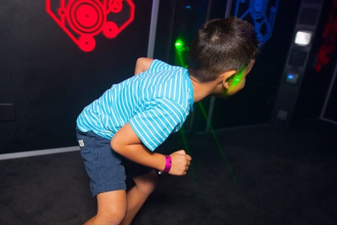 kids playing a game of laser trail 