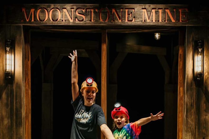 kids playing in the mirror maze