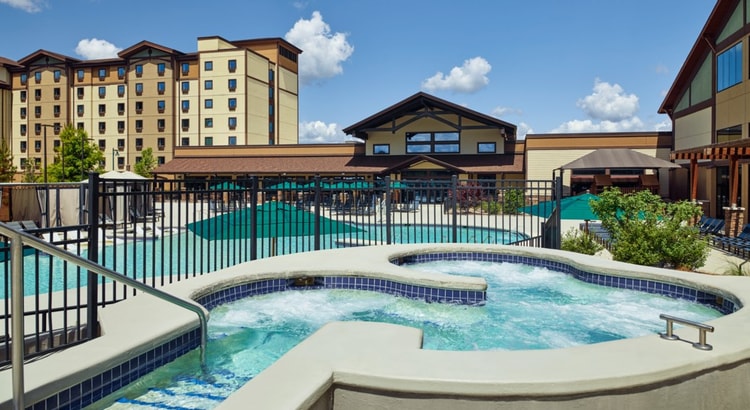 Couples enjoying an outdoor hotub 