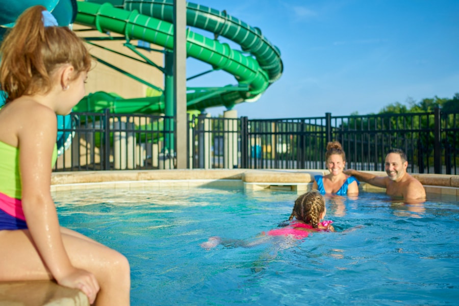 family relaxes in an outdoor hot tub