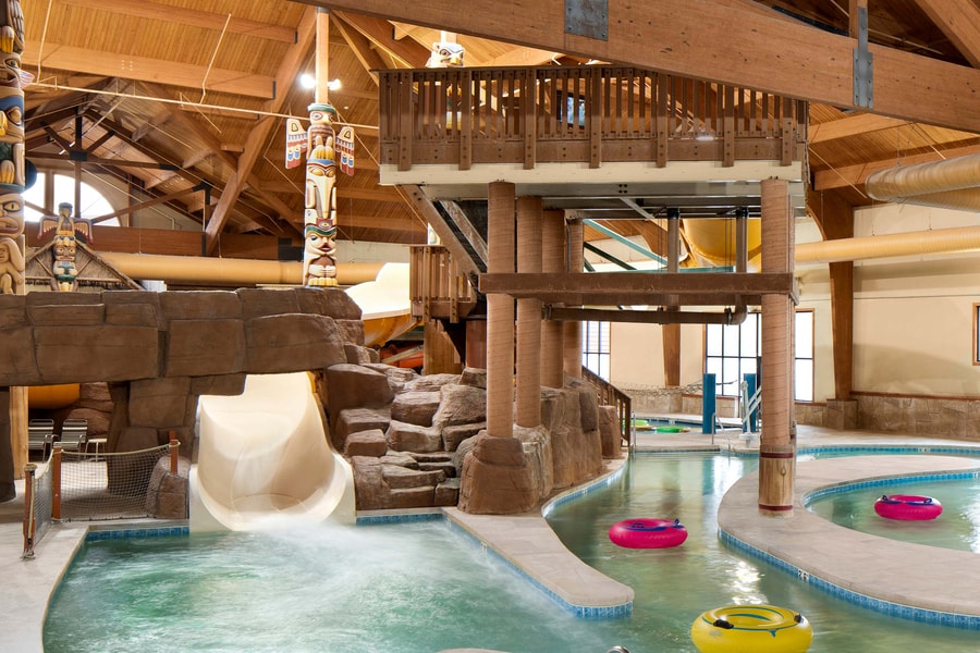 Body slide surrounded by rock decor