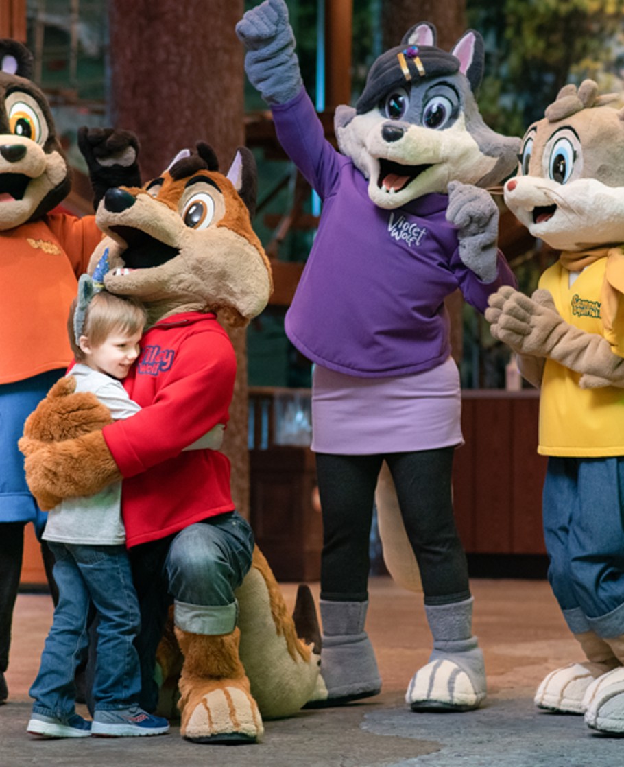 Wiley the wolf and a boy during a dance party