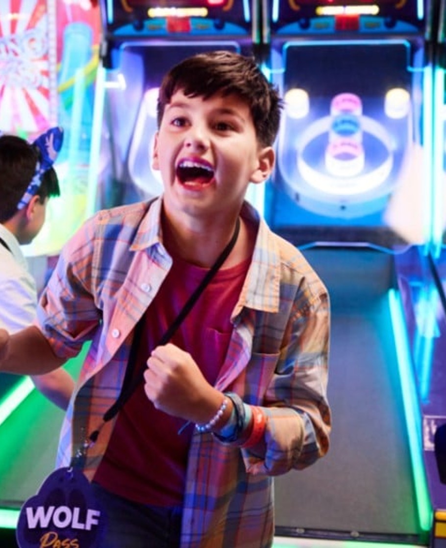 mother and two daughters in a wave pool