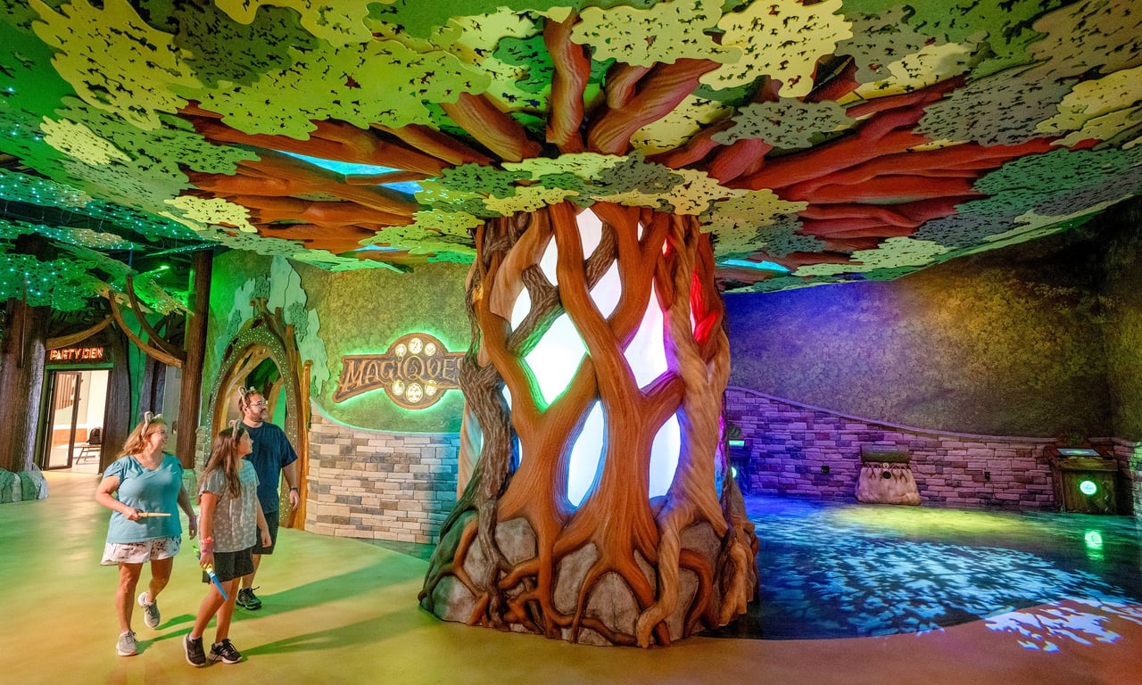 Family entering the Magiquest area