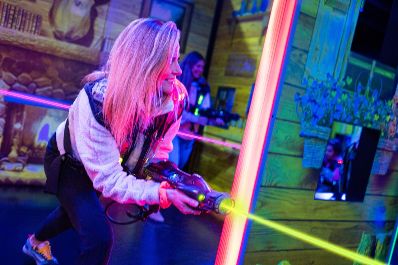 Family playing the game of Laser Tag