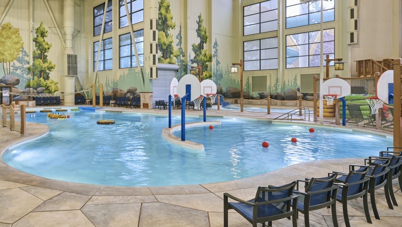 Indoor water park featuring basketball hoops
